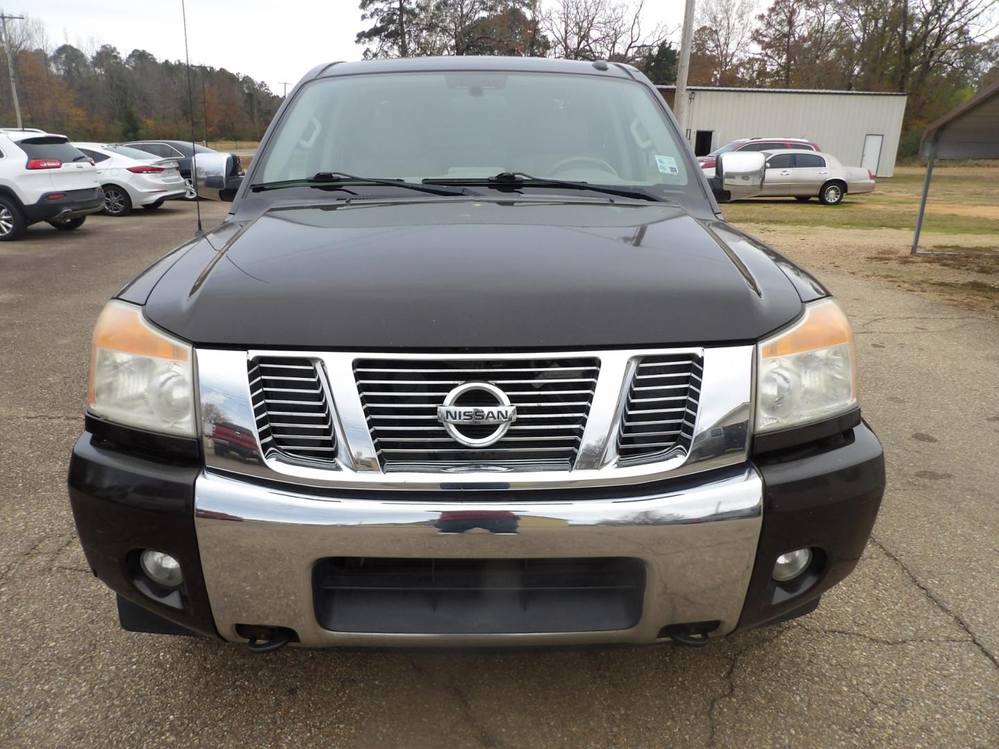 2015 Nissan Titan S Crew Cab 4WD (1N6BA0EC7FN) with an 5.6L V8 DOHC 32V FFV engine, 5-Speed Automatic transmission, located at 401 First NE, Bearden, AR, 71720, (870) 687-3414, 33.726528, -92.611519 - Photo#18